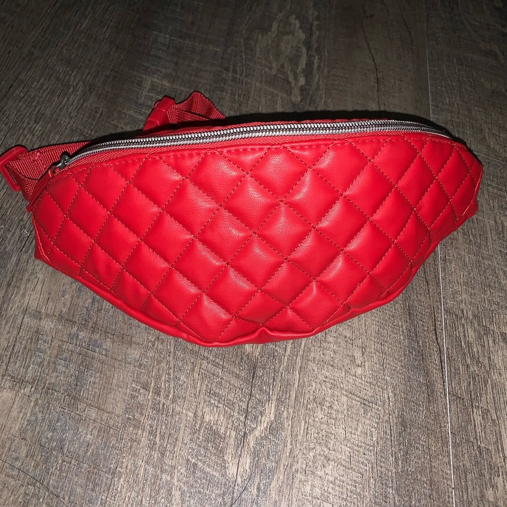 Red fanny pack with adjustable strap